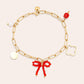 Zapestnica Sweet Various Charms 17 cm - rdeča kristalna mašnica zlata deteljica - kirurško jeklo 316L